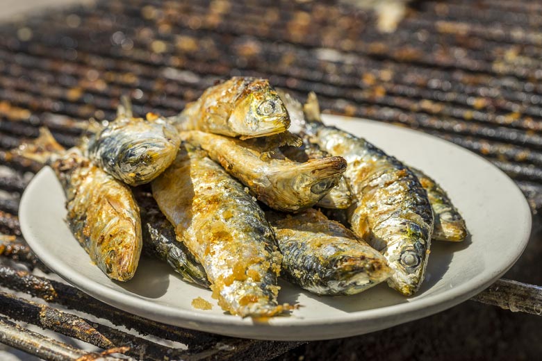 Traditional grilled sardines, Algarve, Portugal