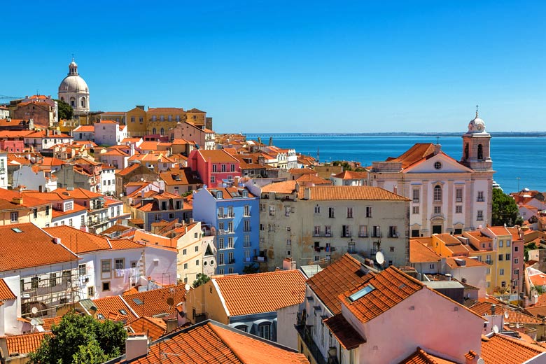Visit the Alfama district in Lisbon, Portugal
