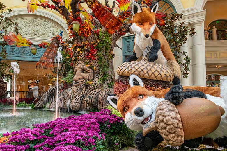 Frolicking foxes in a previous display at Bellagio Conservatory © Mark Damon - Las Vegas News Bureau