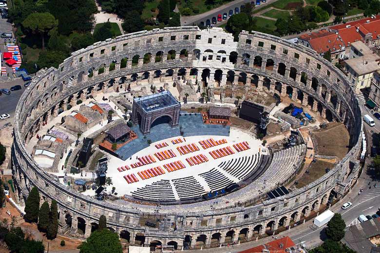Stage set for a concert in the Roman amphitheatre in Pula, Istria © Jeroen Komen - Wikimedia Commons