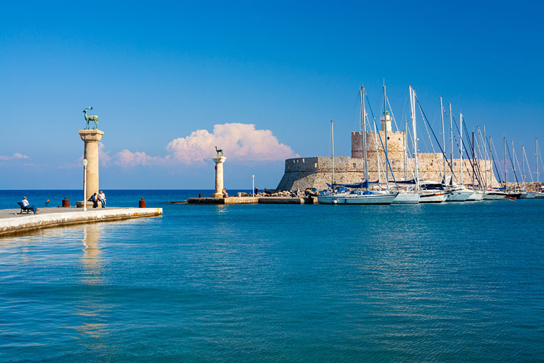 Deer guarding the entrance to Mandraki Harbour