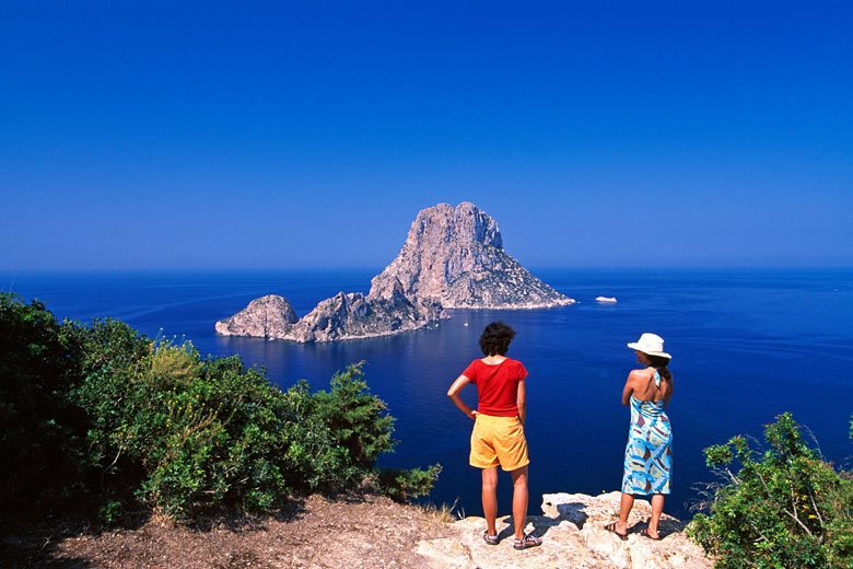 The rocky island of Es Vedrà off the southwest tip of Ibiza © imageBROKER - Alamy Stock Photo