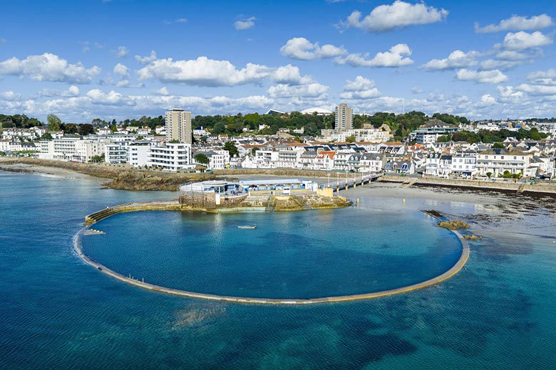 The 19th-century arc of Havre des Pas lido
