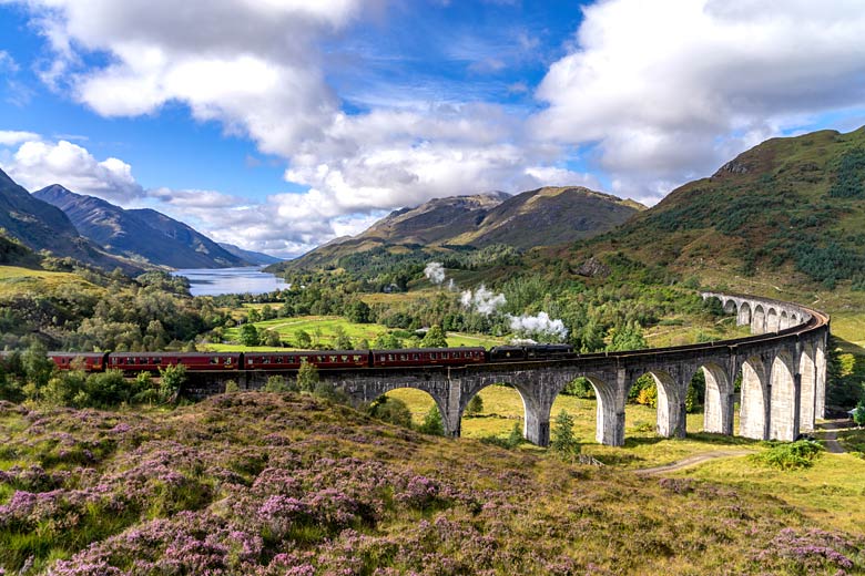 The Jacobite steaming across the Glenfinnan Viaduct The Jacobite steaming across the Glenfinnan Viaduct