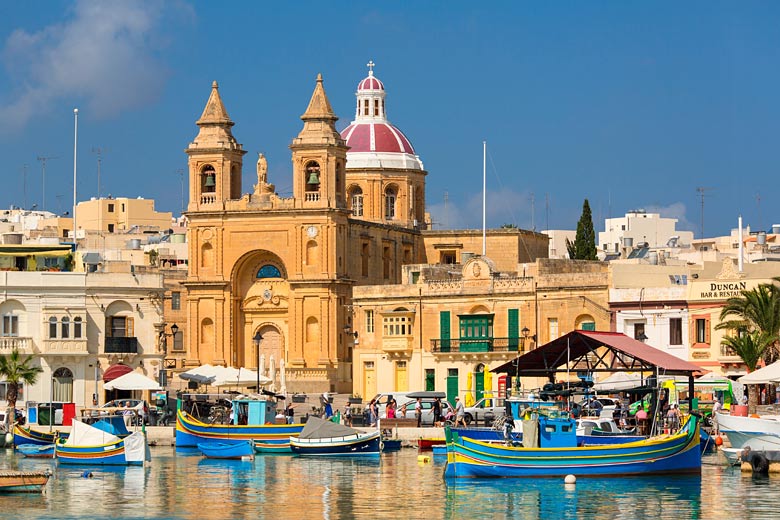 Church on the harbour in Marsaxlokk