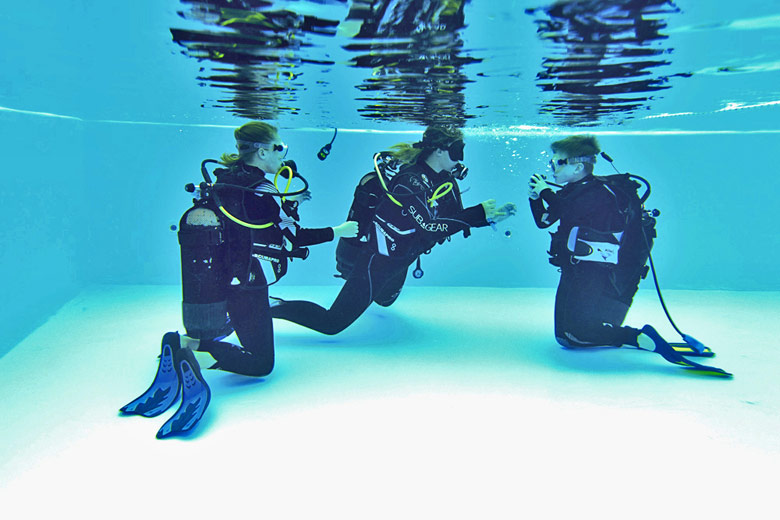 Learning the basics of scuba in the pool with Mark Warner