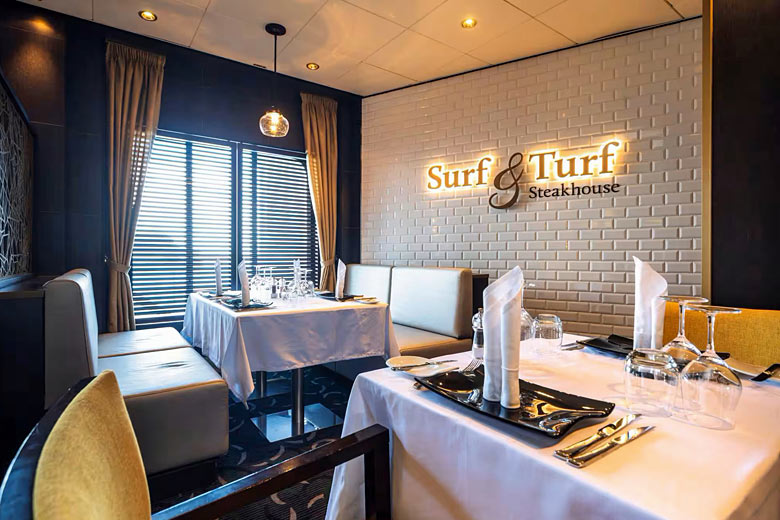 The premium Surf & Turf Steakhouse, enjoyable for an extra fee