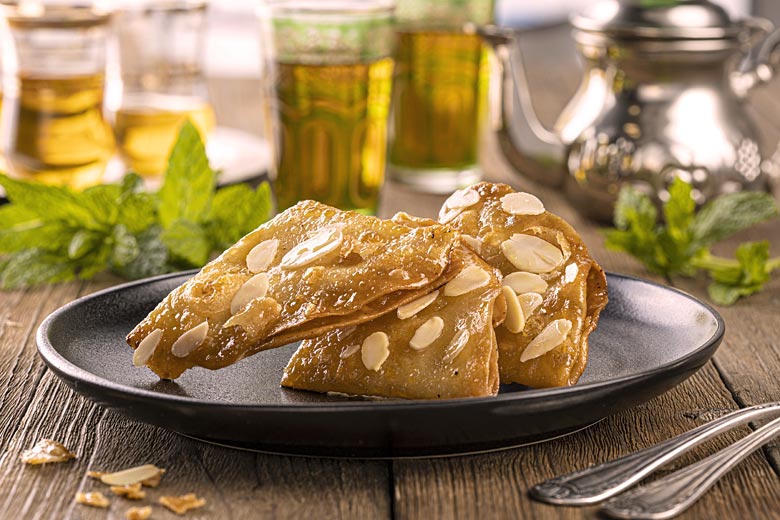 Briouat, Moroccan sweet pastry dipped in honey © Hans Geel - Adobe Stock Image