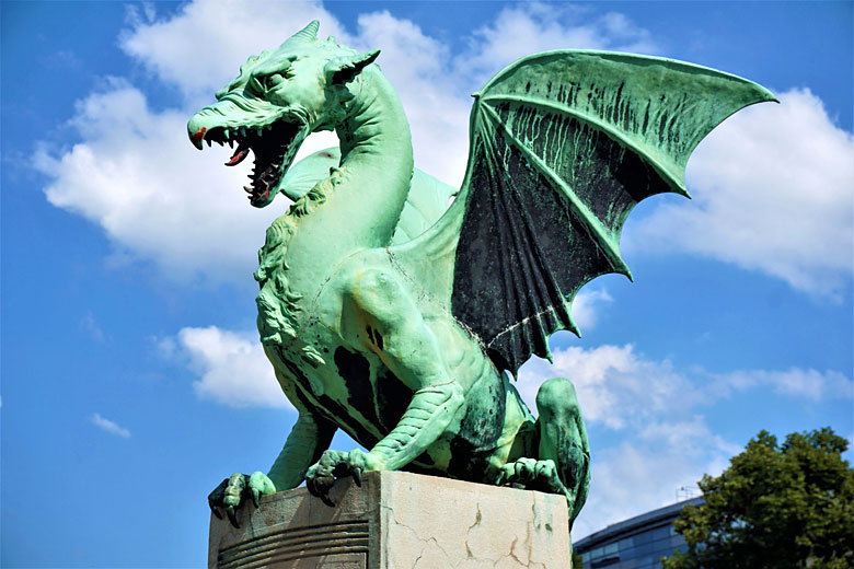 One of four dragons on the Dragon Bridge in Ljubljana, Slovenia © Travelguy - Fotolia.com