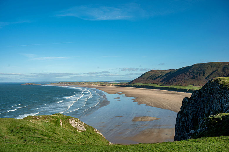 The wide sweep of Rhossili Bay on the Gower Peninsula © Anders93 - Adobe Stock Image