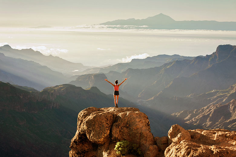 Standing on the summit of Roque Nublo, Gran Canaria Standing on the summit of Roque Nublo, Gran Canaria