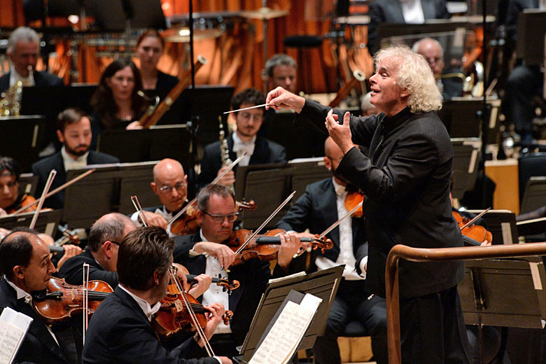 Sir Simon Rattle in action with the London Symphony Orchestra