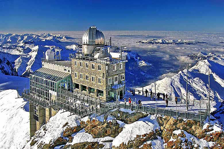 The Sphinx Observatory perched high on the Jungfraujoch © Julius Silver - Wikimedia Commons