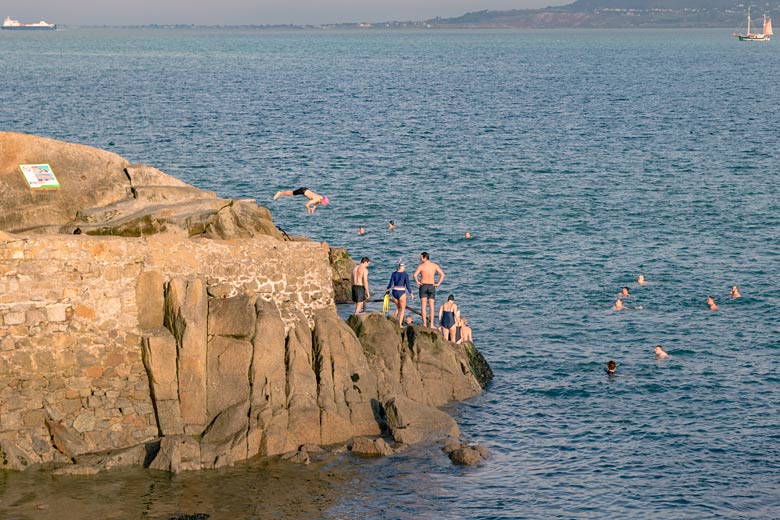 Swimmers at the Forty Foot, Sandycove © Clive - Adobe Stock Image