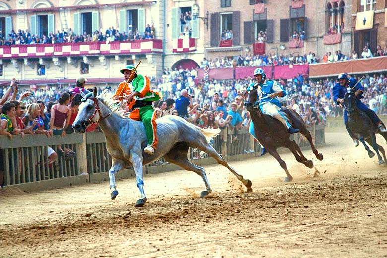 The Palio is run around the main square of Siena © Odyssey-Images - Alamy Stock Photo