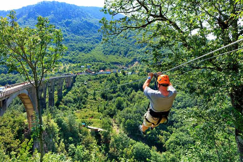 Ziplining over the Tara River at Durdevica Tara Bridge