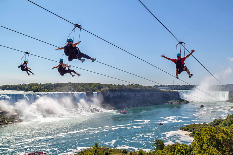 Soar over the blue at Zipline to the Falls